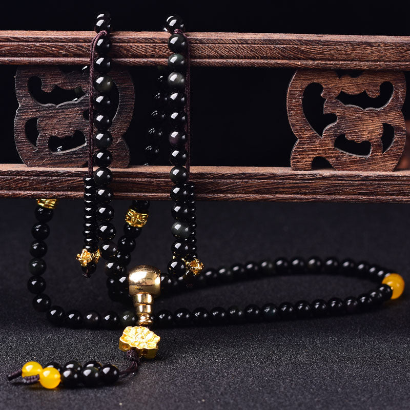 Black Obsidian Lotus 108-Bead Mala Bracelet — product view 5