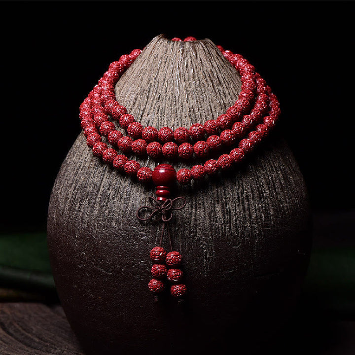 Cinnabar Om Mani Padme Hum Pattern Engraved 108-Bead Mala Bracelet — main product view
