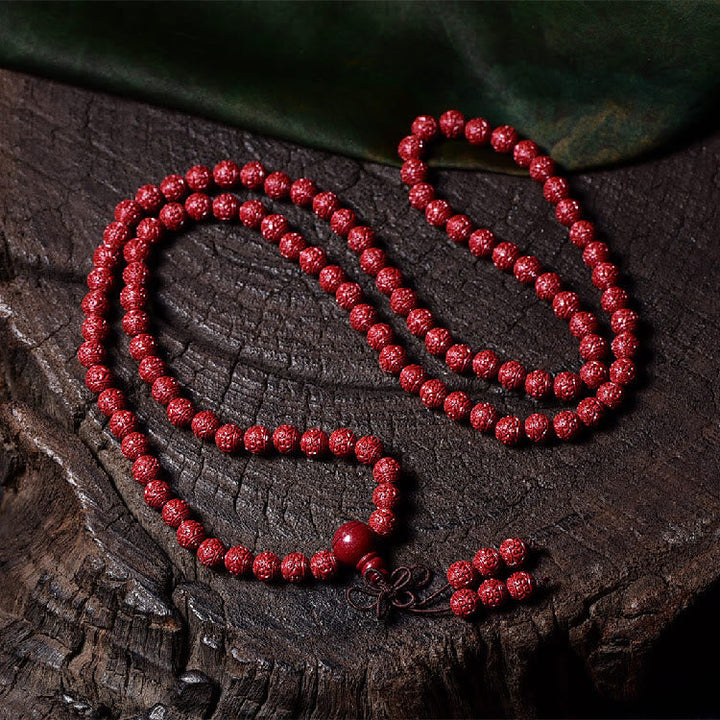 Cinnabar Om Mani Padme Hum Pattern Engraved 108-Bead Mala Bracelet — product view 2