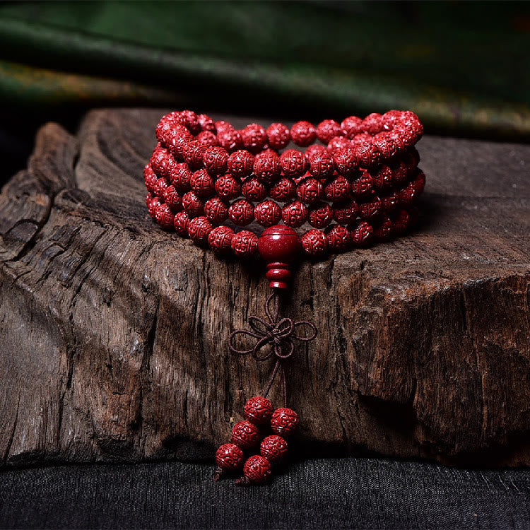 Cinnabar Om Mani Padme Hum Pattern Engraved 108-Bead Mala Bracelet — product view 3
