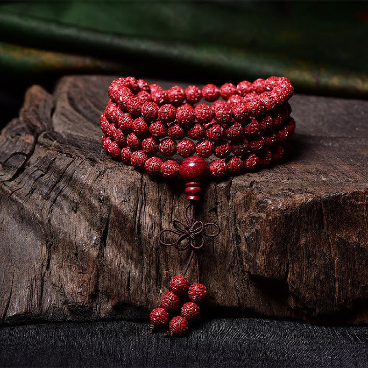 Cinnabar Om Mani Padme Hum Pattern Engraved 108-Bead Mala Bracelet — product view 3