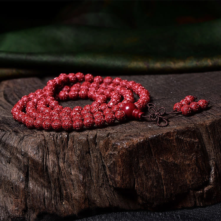 Cinnabar Om Mani Padme Hum Pattern Engraved 108-Bead Mala Bracelet — product view 4