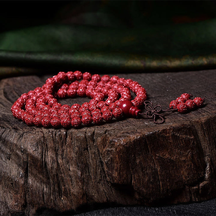 Cinnabar Om Mani Padme Hum Pattern Engraved 108-Bead Mala Bracelet — product view 4