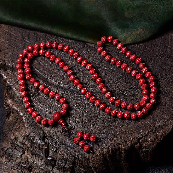 Cinnabar Om Mani Padme Hum Pattern Engraved 108-Bead Mala Bracelet — product view 7