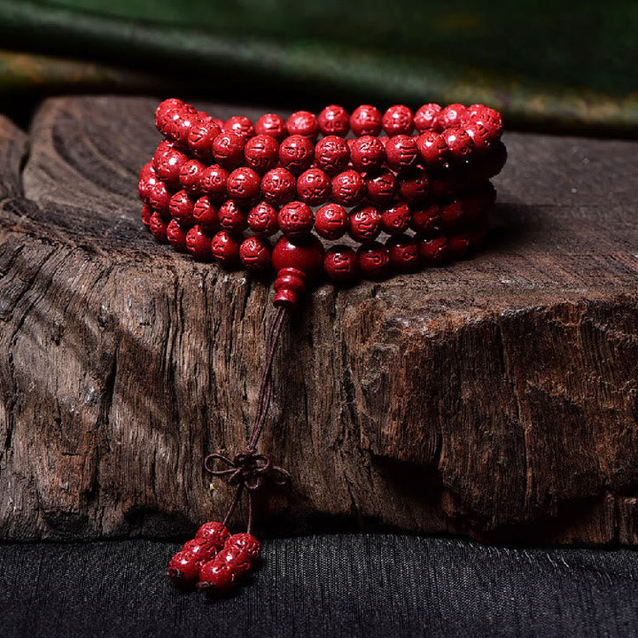 Cinnabar Om Mani Padme Hum Pattern Engraved 108-Bead Mala Bracelet — product view 9
