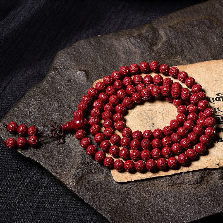 Cinnabar Om Mani Padme Hum Pattern Engraved 108-Bead Mala Bracelet — product view 10