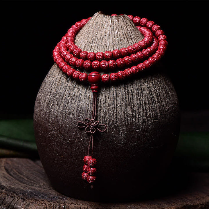 Cinnabar Om Mani Padme Hum Pattern Engraved 108-Bead Mala Bracelet — product view 13