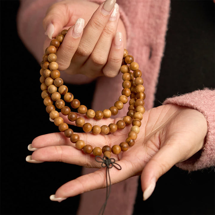 Lightning Strike Peach Wood 108-Bead Mala Bracelet — product view 4