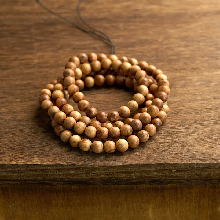 Lightning Strike Peach Wood 108-Bead Mala Bracelet — product view 7
