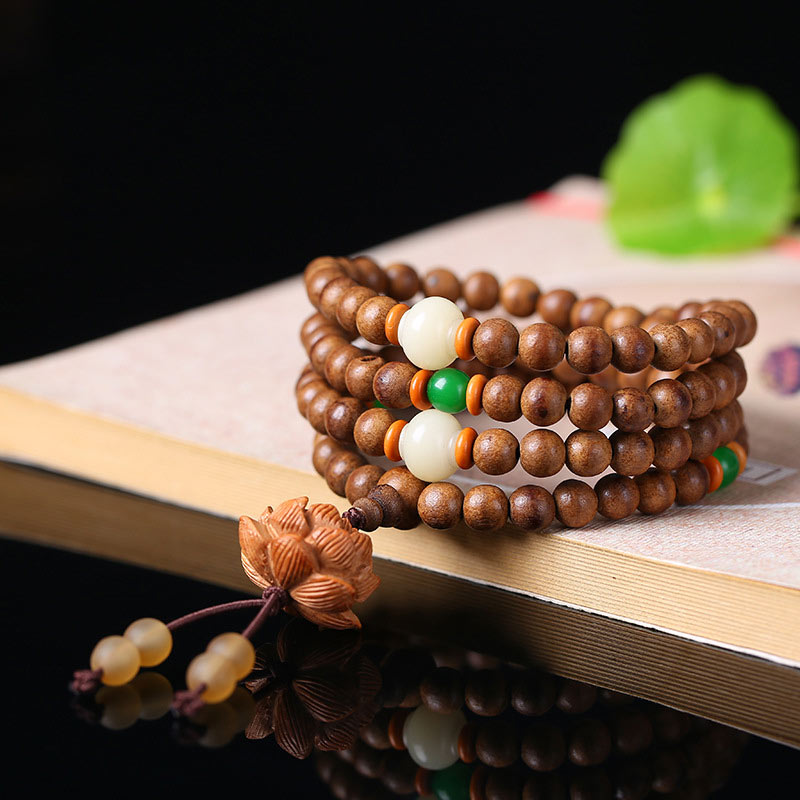 Peach Wood Bodhi Seed Lotus 108-Bead Mala Bracelet — product view 2