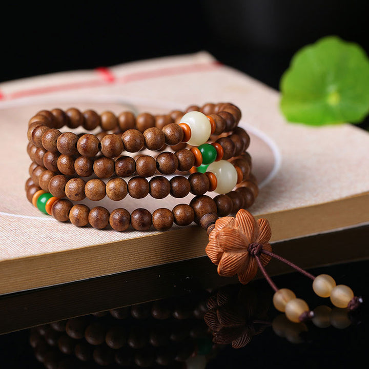 Peach Wood Bodhi Seed Lotus 108-Bead Mala Bracelet — product view 3