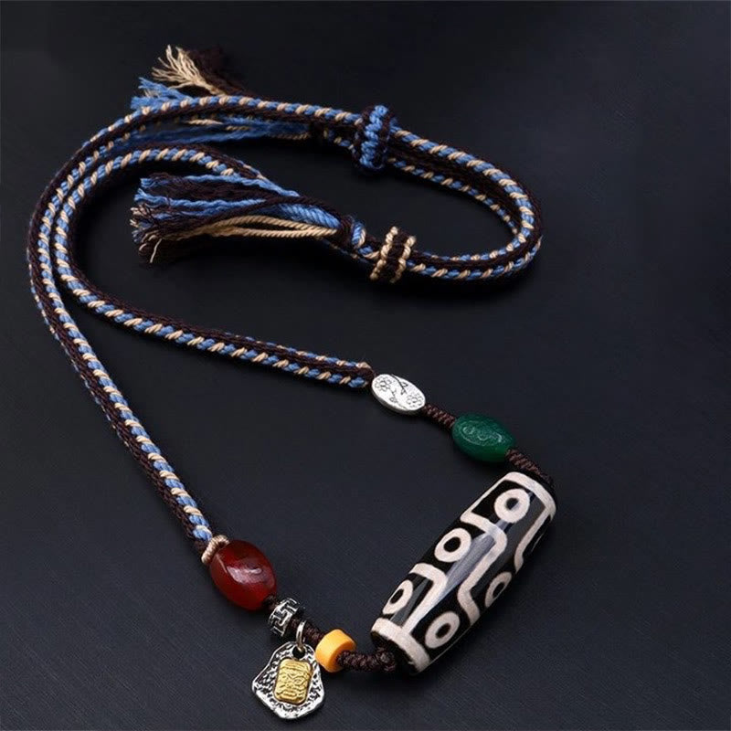 Tibetan nine-eye Dzi bead cord pendant — view 9