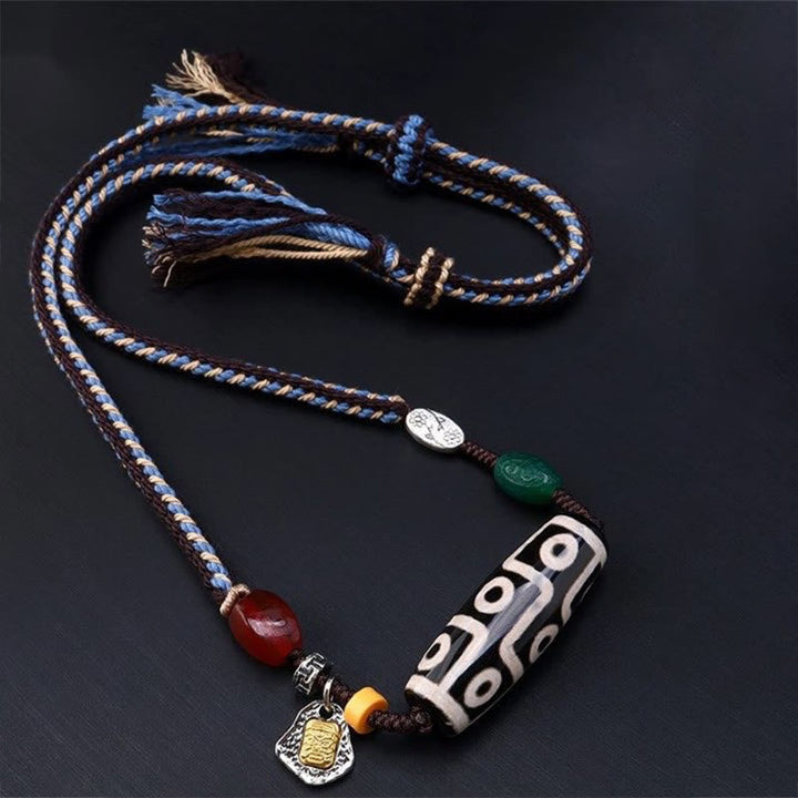 Tibetan nine-eye Dzi bead cord pendant — view 9