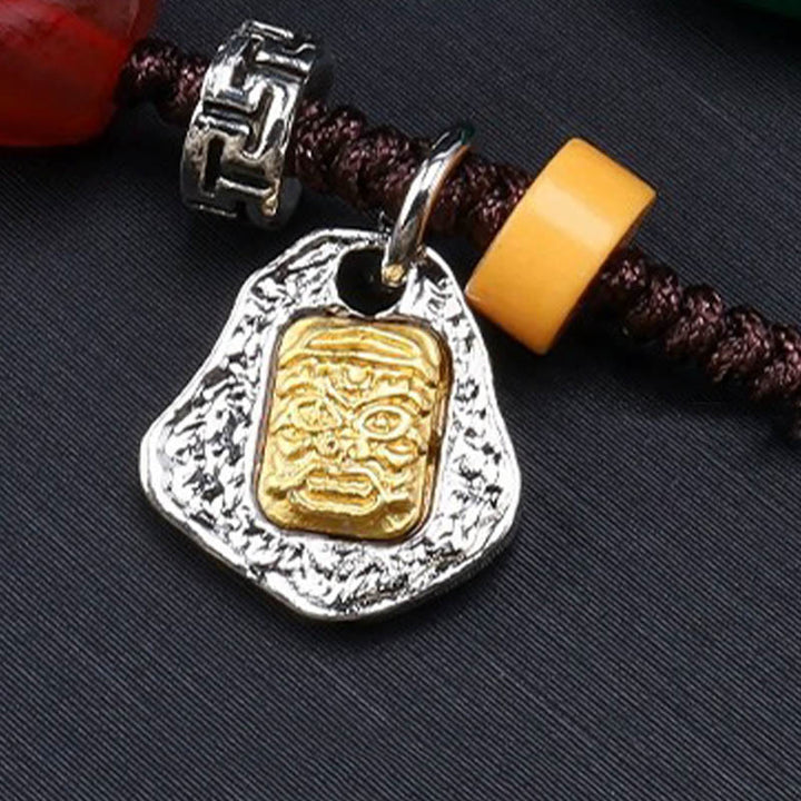 Tibetan nine-eye Dzi bead cord pendant — view 4