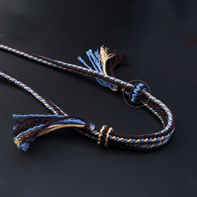 Tibetan nine-eye Dzi bead cord pendant — view 3