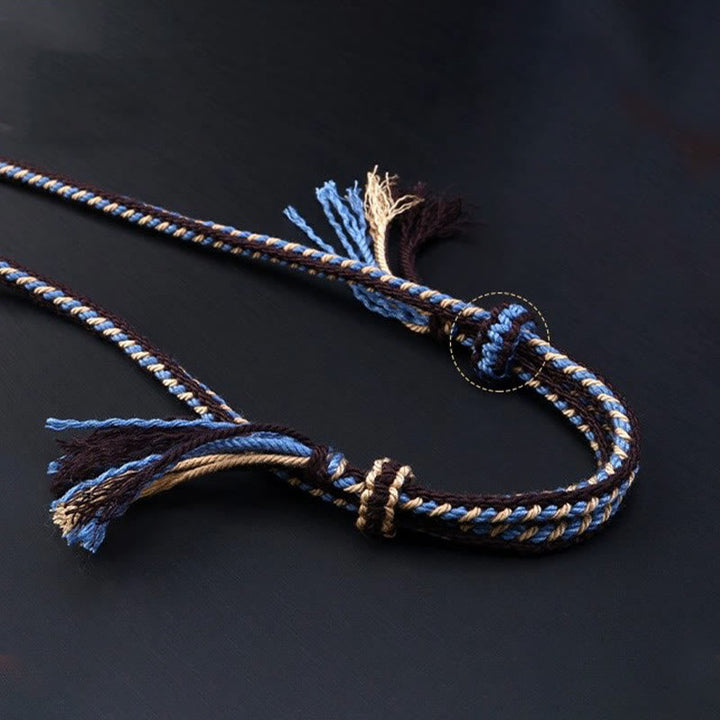 Tibetan nine-eye Dzi bead cord pendant — view 3
