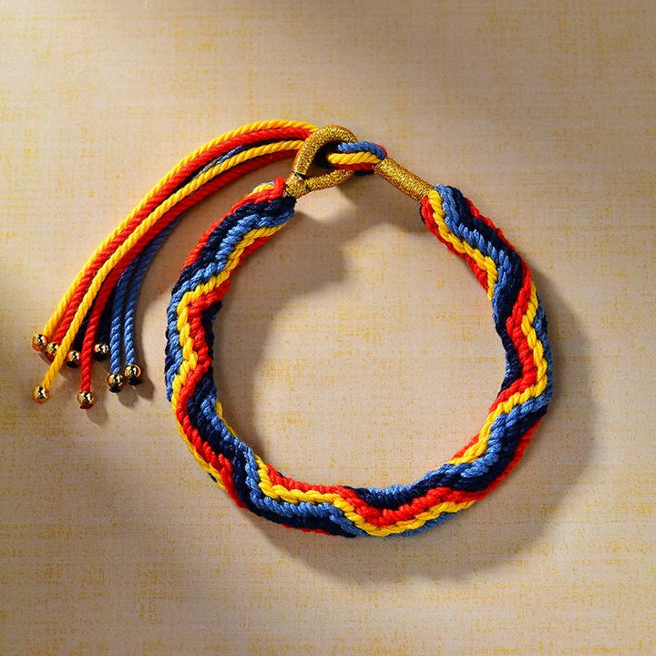 Handwoven multicolor cord bracelet with adjustable sliding knot