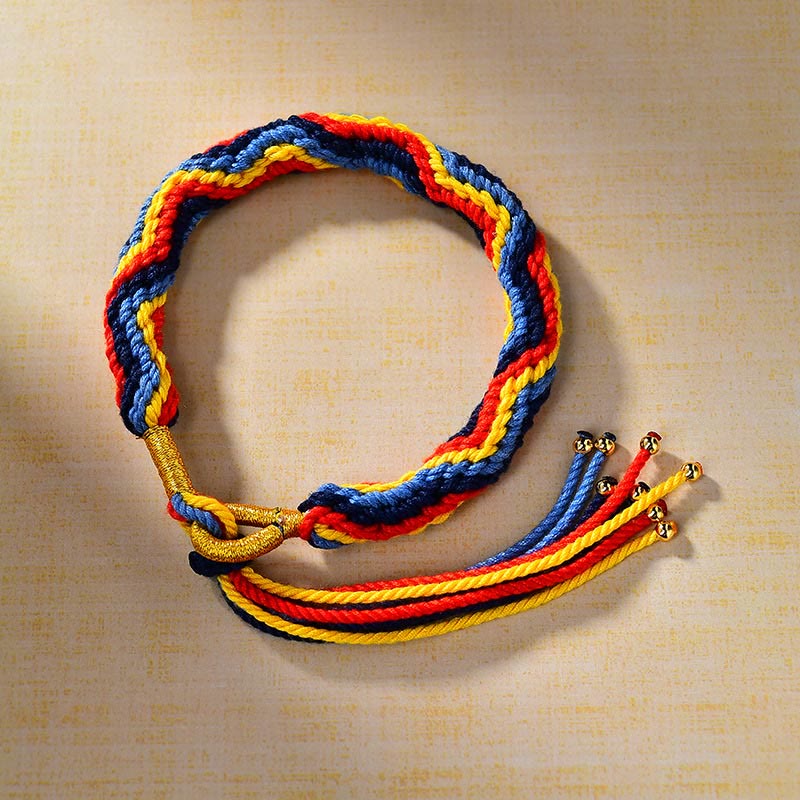 Handwoven color cord bracelet detail with knotted finish