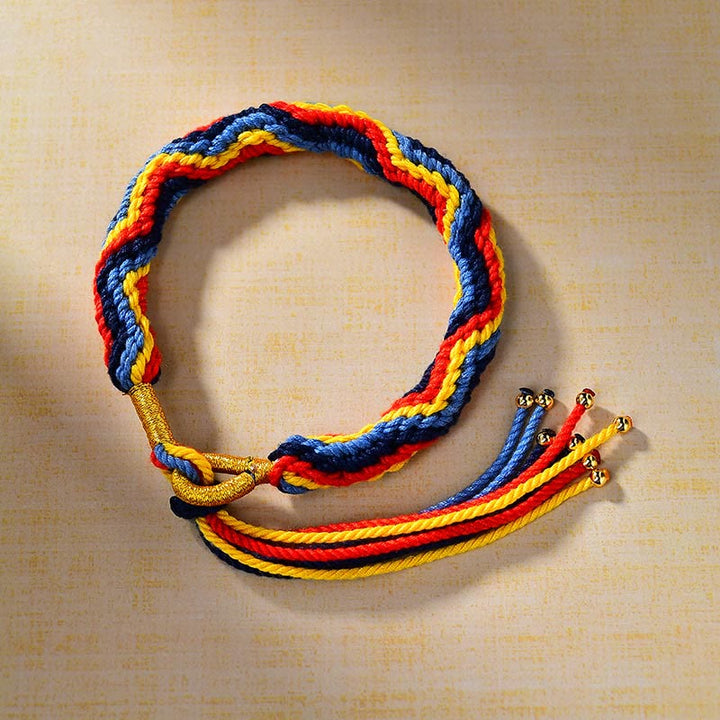 Handwoven color cord bracelet detail with knotted finish