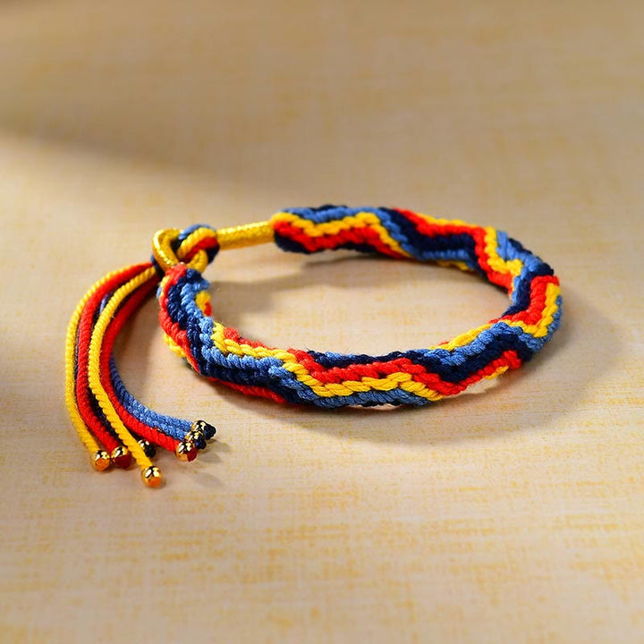 Close-up of handwoven multicolor textile cord bracelet