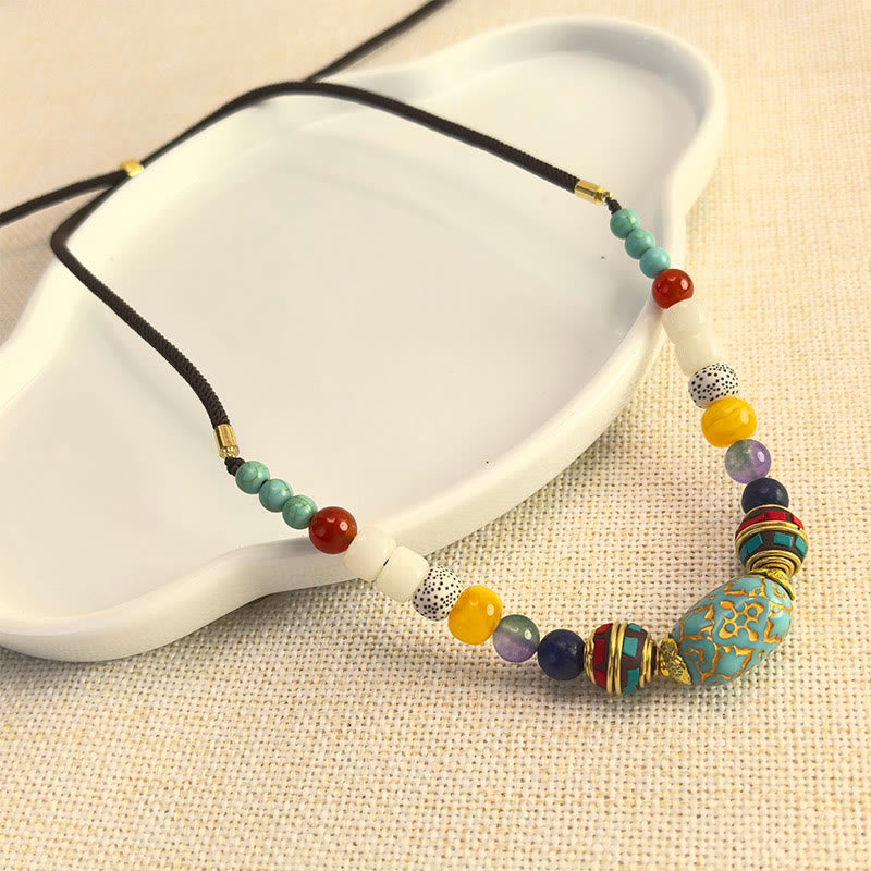 Tibetan turquoise bead pendant — view 1