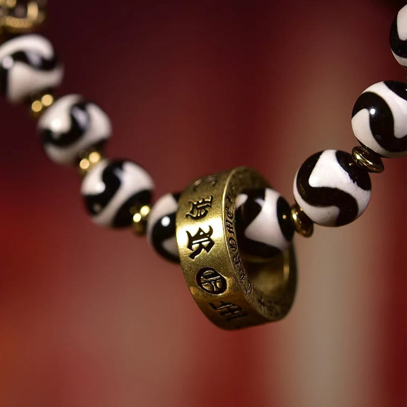 Dzi bead and copper mantra bracelet — view 5