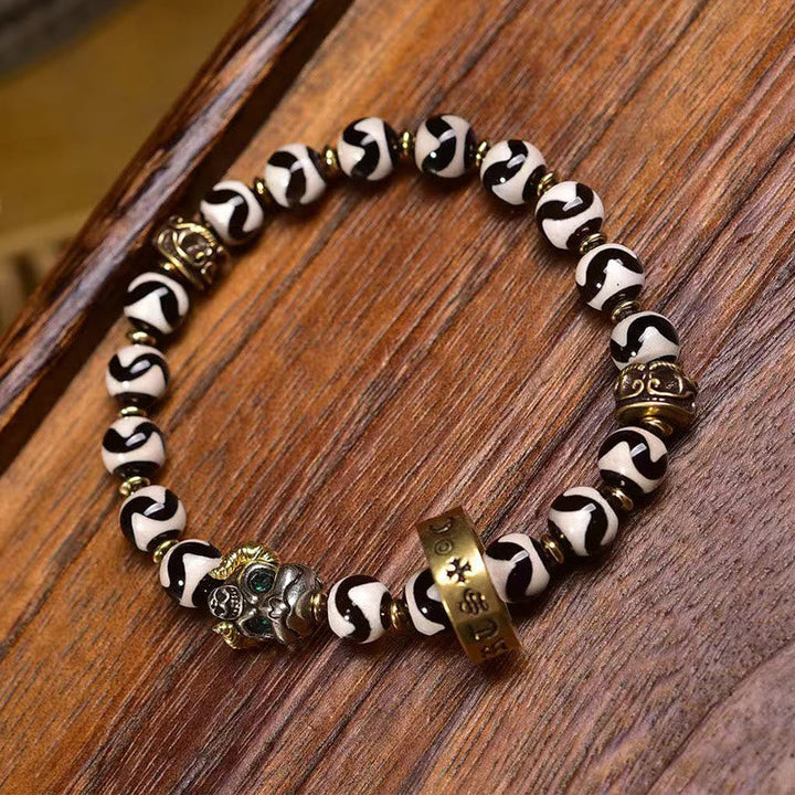 Dzi bead and copper mantra bracelet — view 2