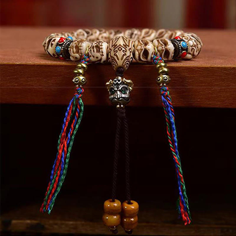 Buddha Stones Tibetan Camel Bone Garuda Carved Protection Tassel Bracelet