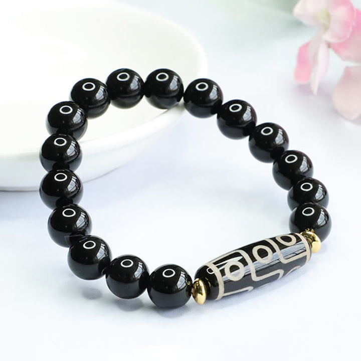 Tibetan Nine-Eye Dzi Bead and Black Onyx Bracelet — view 2