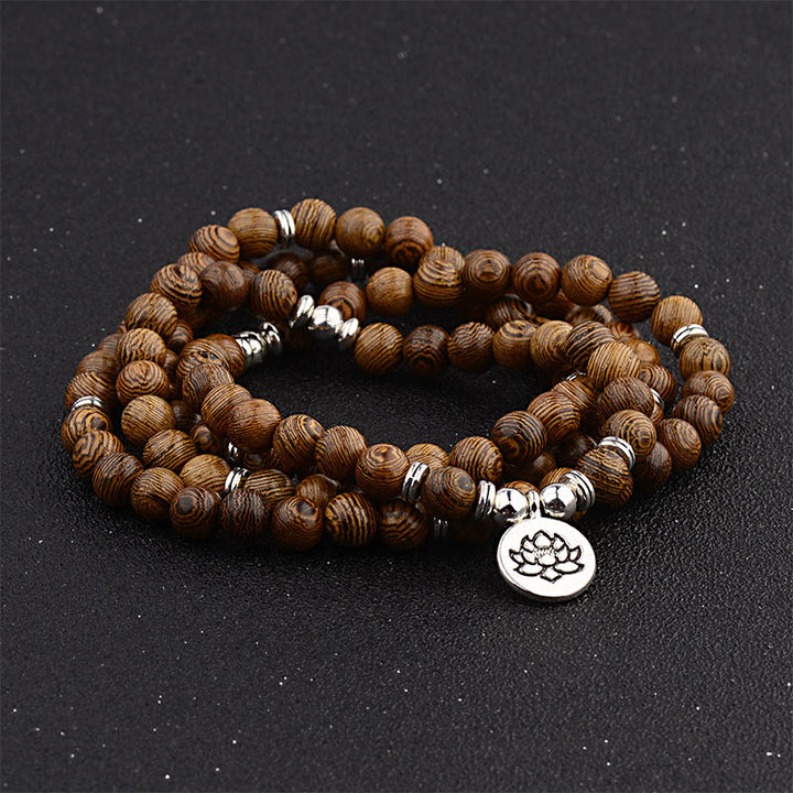 Wood bead lotus charm mala — view 2
