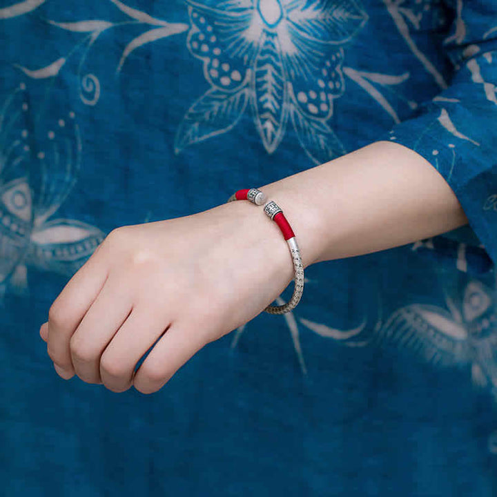 Tibetan mantra red string bangle — view 3