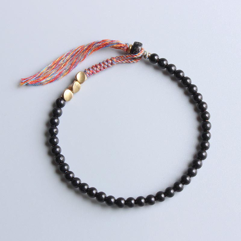 Black onyx tassel bracelet — view 1