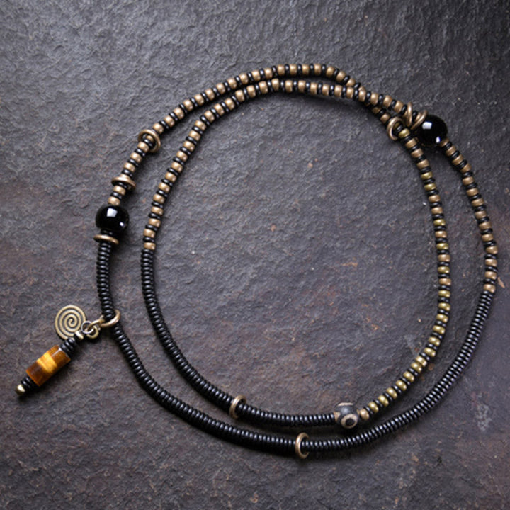 Ebony wood Dzi bead and copper bracelet — view 2