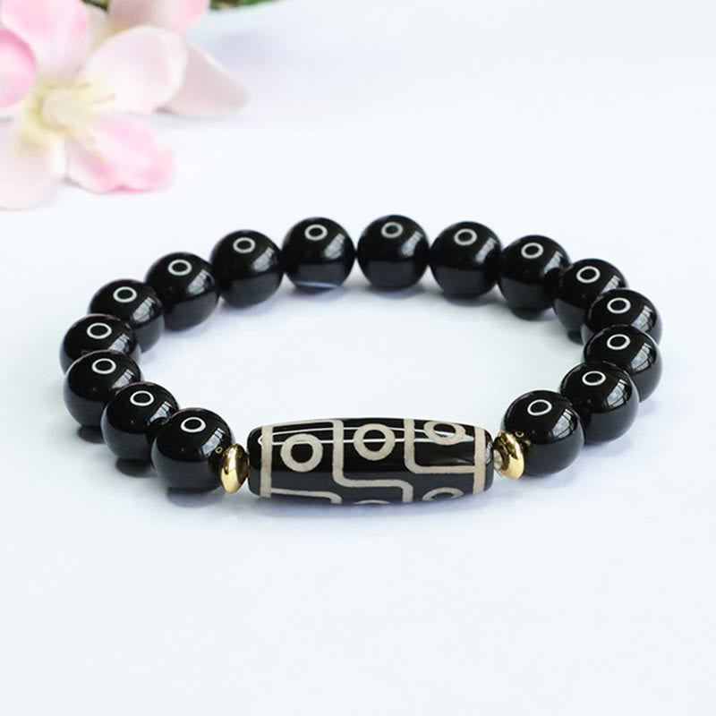 Tibetan Nine-Eye Dzi Bead and Black Onyx Bracelet — view 1