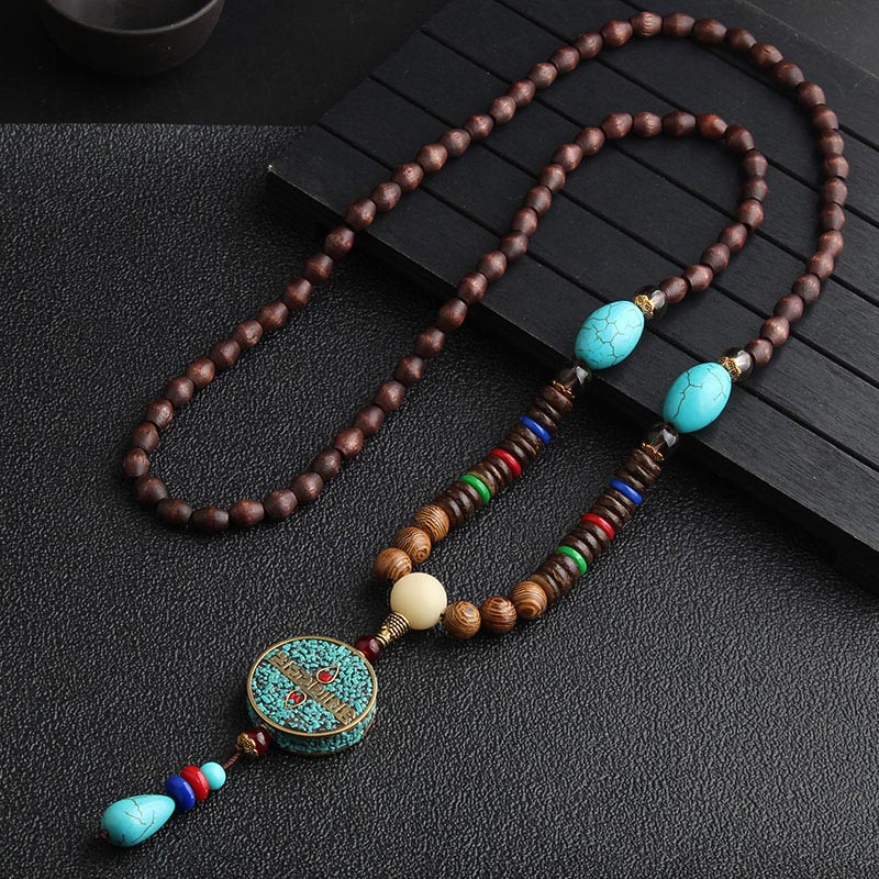 Turquoise Dzi bead prayer wheel necklace — view 1