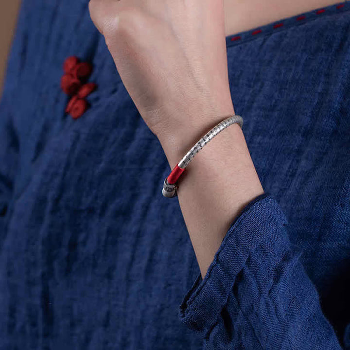 Tibetan mantra red string bangle — view 2