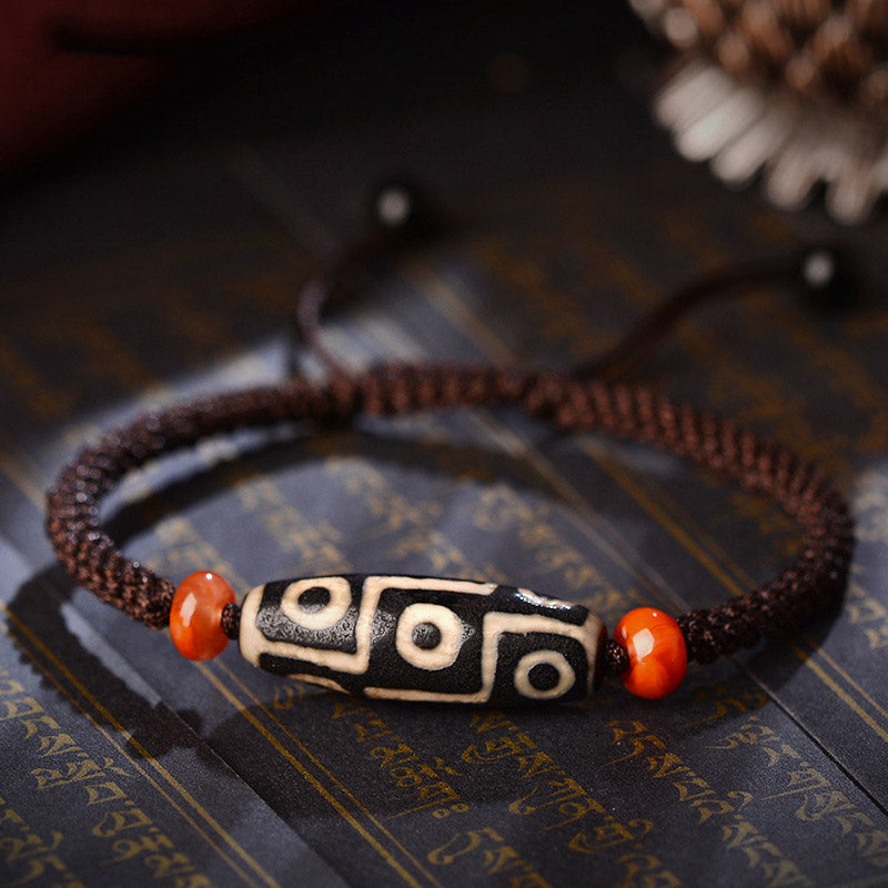 Nine-Eye Dzi bead cord bracelet — view 1