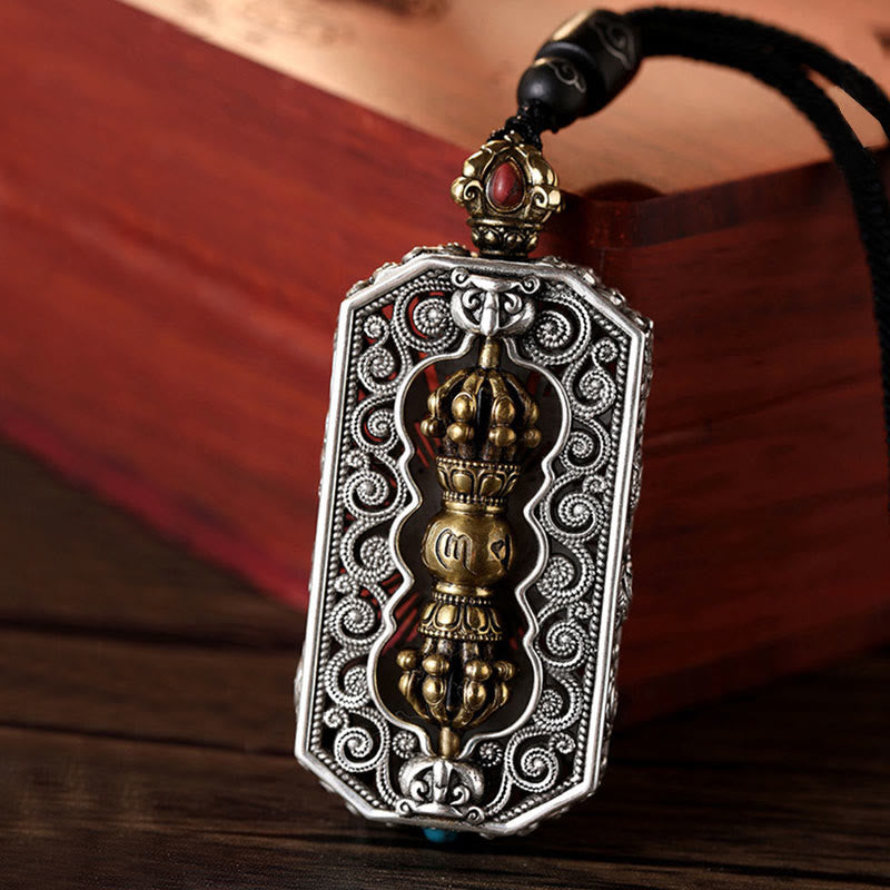 Rotating Dorje and lotus mantra pendant — view 1