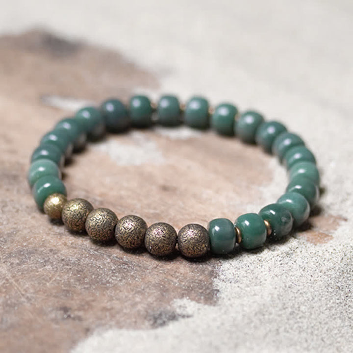 Tibetan cyan Bodhi seed and copper bracelet — view 1