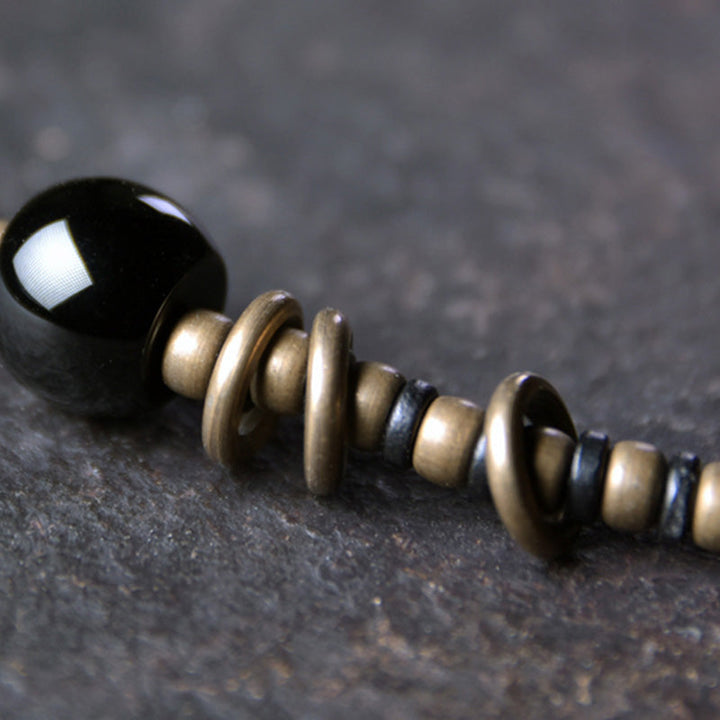 Ebony wood Dzi bead and copper bracelet — view 11