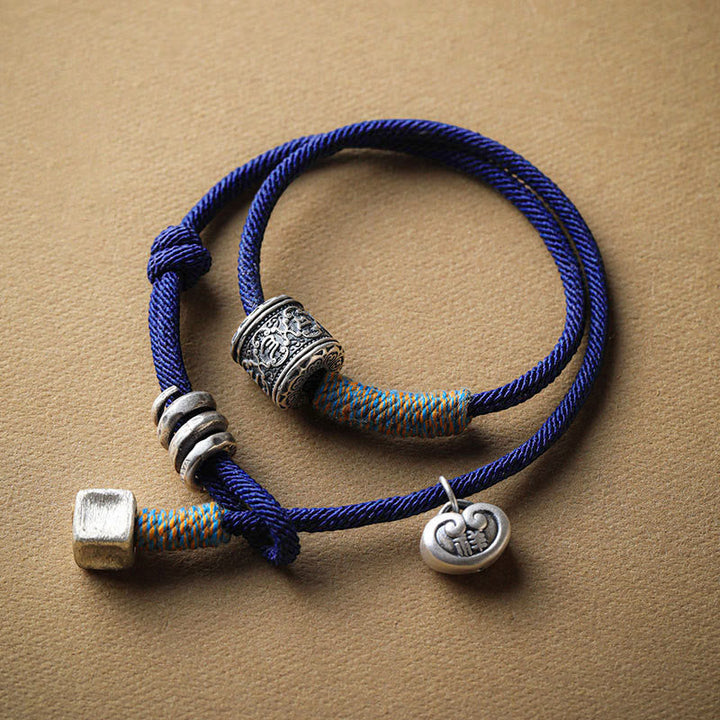 Om Mani Padme Hum double-wrap cord bracelet — view 1