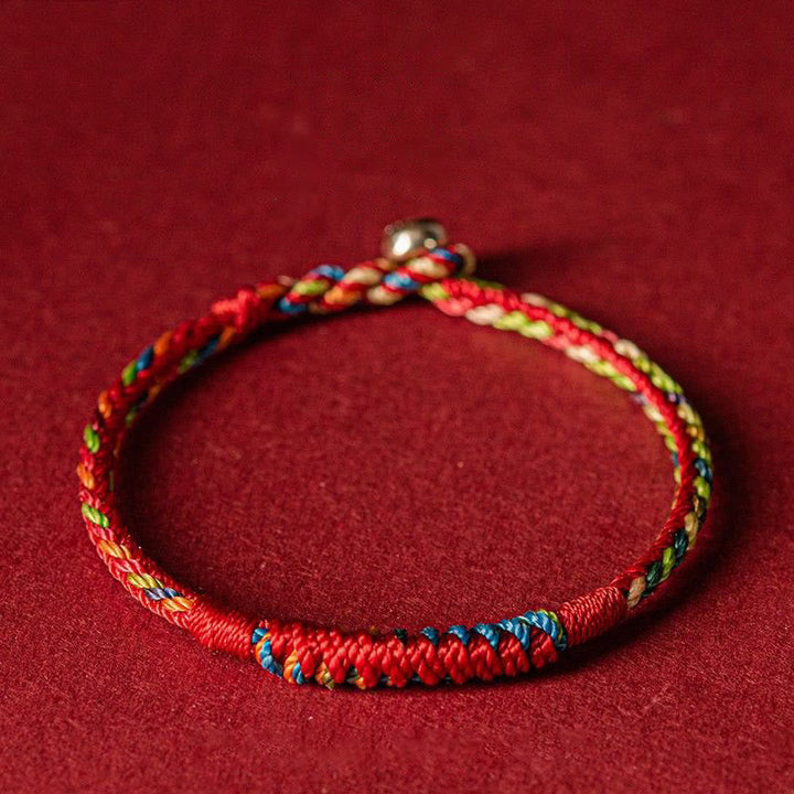 Handwoven five-color thread bracelet with multicolor cord detail