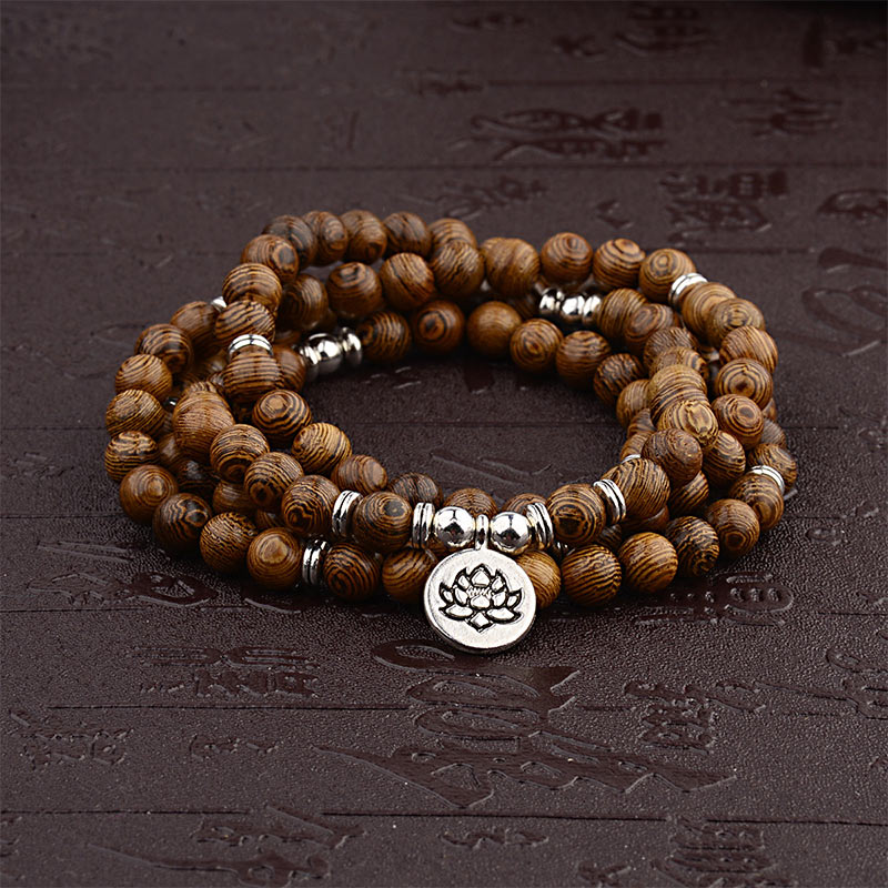Wood bead lotus charm mala — view 1