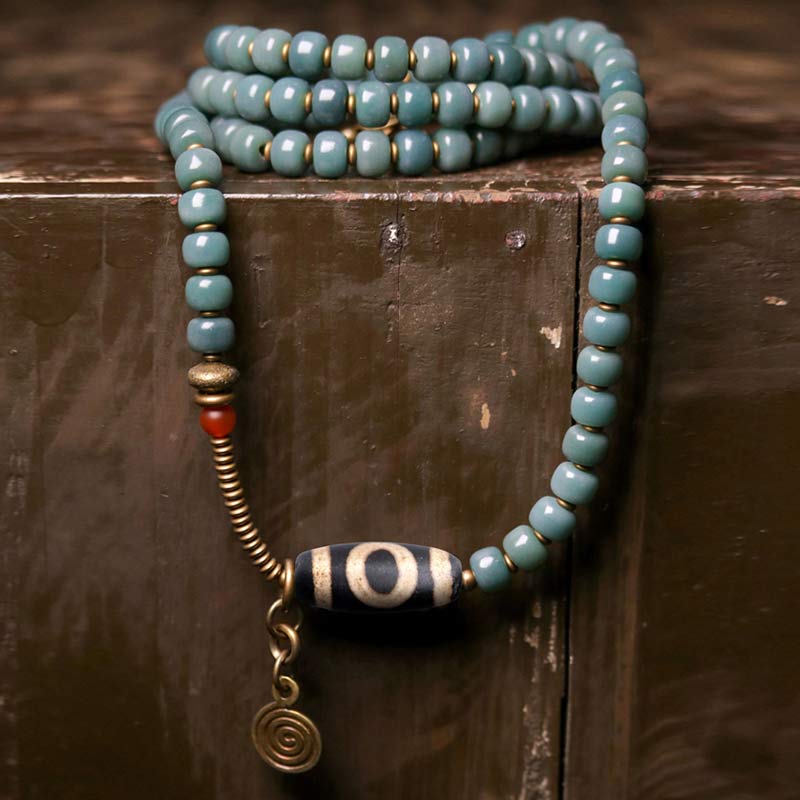 Bodhi seed and Dzi bead mala bracelet — view 1