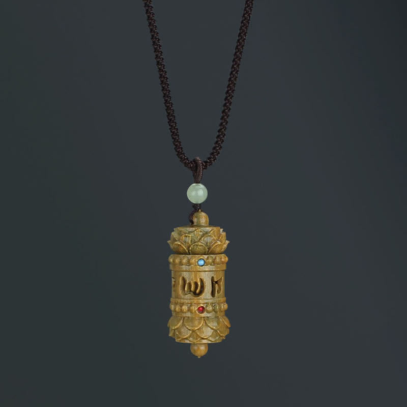 Green sandalwood and rosewood lotus pendant — view 1