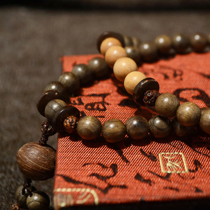 Tibetan sandalwood charm mala bracelet — view 1