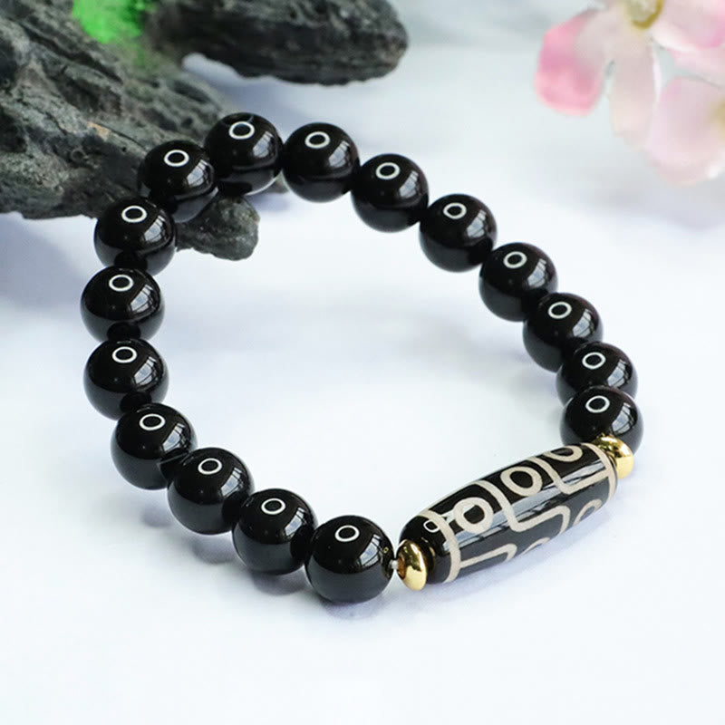 Tibetan Nine-Eye Dzi Bead and Black Onyx Bracelet — view 3