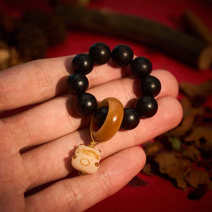 Ebony Wood Charcoal-Grilled Cat & Bear Beads Tactile Meditation Beads — main product view
