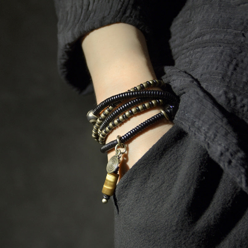 Ebony wood Dzi bead and copper bracelet — view 3