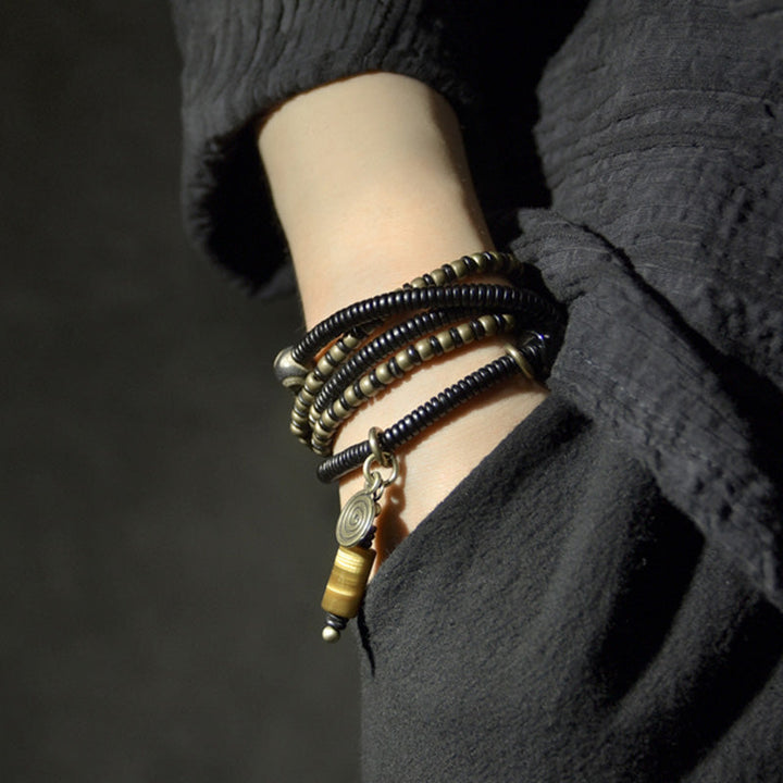 Ebony wood Dzi bead and copper bracelet — view 3